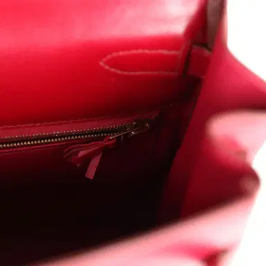 HERMÈS Pre-owned Hermes Ghillies Kelly Retourne 35 Rubis Tadelakt Permabrass Hardware | Thumbnail 8 HERMÈS Pre-owned Hermes Ghillies Kelly Retourne 35 Rubis Tadelakt Permabrass Hardware | Thumbnail 8