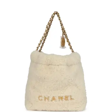 Chanel Chanel Mini 22 Bag Ecru Shearling Gold Hardware | Thumbnail 1 Chanel Chanel Mini 22 Bag Ecru Shearling Gold Hardware | Thumbnail 1