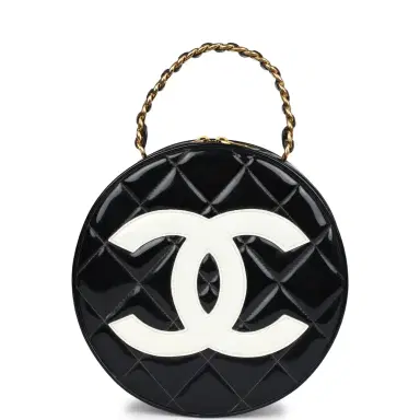 Chanel Vintage Chanel Round Vanity Bag Black and White Patent Leather Antique Gold Hardware | Thumbnail 1 Chanel Vintage Chanel Round Vanity Bag Black and White Patent Leather Antique Gold Hardware | Thumbnail 1