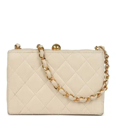 Chanel Vintage Chanel Box Clutch Bag Beige Lambskin Gold Hardware | Thumbnail 1 Chanel Vintage Chanel Box Clutch Bag Beige Lambskin Gold Hardware | Thumbnail 1