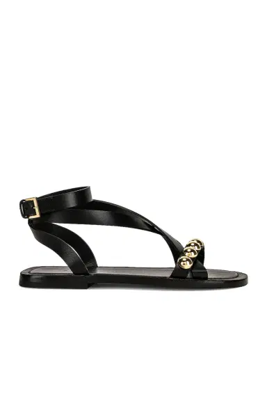 Alaïa Flat Ankle Strap Sandals | Thumbnail 1 Alaïa Flat Ankle Strap Sandals | Thumbnail 1