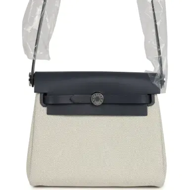 HERMÈS Hermes Herbag Zip 20 Mini Ecru and Bleu Glacier Toile H Canvas and Ardoise Vache Hunter Palladium Hardware | Thumbnail 1 HERMÈS Hermes Herbag Zip 20 Mini Ecru and Bleu Glacier Toile H Canvas and Ardoise Vache Hunter Palladium Hardware | Thumbnail 1