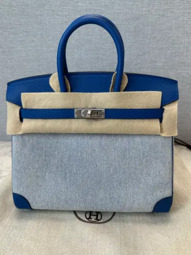 Madison Avenue Couture Hermes Birkin 25 Bleu France Swift/Bleu Bill-Ecru Toile H Canvas PHW | Thumbnail 1 Madison Avenue Couture Hermes Birkin 25 Bleu France Swift/Bleu Bill-Ecru Toile H Canvas PHW | Thumbnail 1