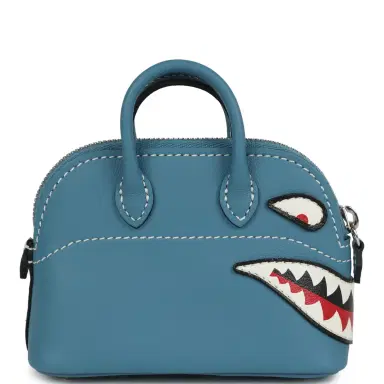 HERMÈS Hermes Mini Bolide Shark Bag Charm Blue Jean, Black and White Swift Palladium Hardware | Thumbnail 4 HERMÈS Hermes Mini Bolide Shark Bag Charm Blue Jean, Black and White Swift Palladium Hardware | Thumbnail 4