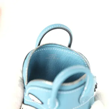 HERMÈS Hermes Mini Bolide Shark Bag Charm Blue Jean, Black and White Swift Palladium Hardware | Thumbnail 9 HERMÈS Hermes Mini Bolide Shark Bag Charm Blue Jean, Black and White Swift Palladium Hardware | Thumbnail 9