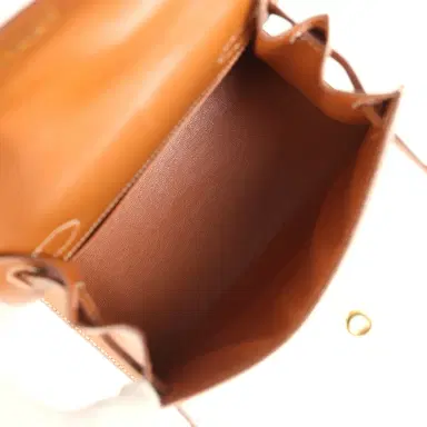 HERMÈS Vintage Hermes Kelly Sellier 20 Gold Courchevel and Ecru-Beige Toile H Canvas Gold Hardware | Thumbnail 7 HERMÈS Vintage Hermes Kelly Sellier 20 Gold Courchevel and Ecru-Beige Toile H Canvas Gold Hardware | Thumbnail 7