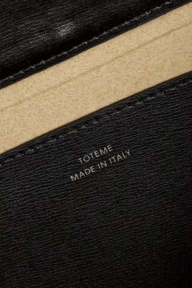 Toteme T-Lock Woven Leather Clutch | Thumbnail 6 Toteme T-Lock Woven Leather Clutch | Thumbnail 6