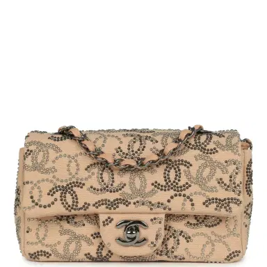 Chanel Pre-owned Chanel Mini CC Studded Rectangular Flap Bag Light Pink Canvas Ruthenium Hardware | Thumbnail 1 Chanel Pre-owned Chanel Mini CC Studded Rectangular Flap Bag Light Pink Canvas Ruthenium Hardware | Thumbnail 1