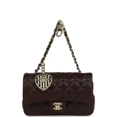 Chanel Chanel Nano Classic Double Flap Bag Charm Dark Brown Lambskin Light Gold Hardware | Thumbnail 1 Chanel Chanel Nano Classic Double Flap Bag Charm Dark Brown Lambskin Light Gold Hardware | Thumbnail 1