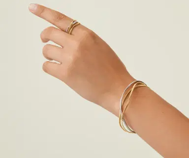 MARCO BICEGO Marco Bicego Marrakech 18K Yellow & White Gold Diamond Layered Twisted Coil Bangle Bracelet by The Solist | Thumbnail 2 MARCO BICEGO Marco Bicego Marrakech 18K Yellow & White Gold Diamond Layered Twisted Coil Bangle Bracelet by The Solist | Thumbnail 2