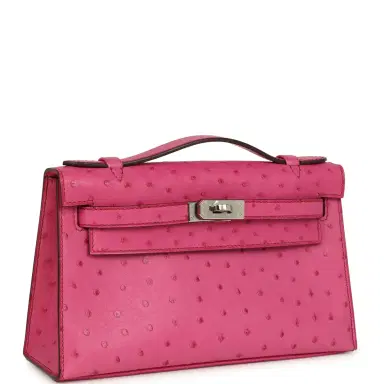 HERMÈS Pre-owned Hermes Kelly Pochette Fuchsia Ostrich Palladium Hardware | Thumbnail 2 HERMÈS Pre-owned Hermes Kelly Pochette Fuchsia Ostrich Palladium Hardware | Thumbnail 2