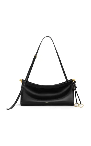 Alaïa Le Click Medium Leather E/W Shoulder Bag | Thumbnail 1 Alaïa Le Click Medium Leather E/W Shoulder Bag | Thumbnail 1