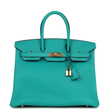 HERMÈS Pre-owned Hermes Birkin 35 Bleu Paon Togo Gold Hardware | Thumbnail 1 HERMÈS Pre-owned Hermes Birkin 35 Bleu Paon Togo Gold Hardware | Thumbnail 1