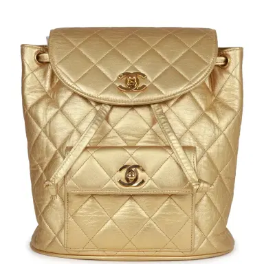 Chanel Vintage Chanel Duma Backpack Gold Metallic Lambskin Gold Hardware | Thumbnail 1 Chanel Vintage Chanel Duma Backpack Gold Metallic Lambskin Gold Hardware | Thumbnail 1