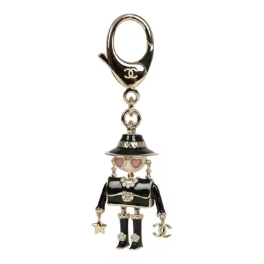 Chanel Chanel Gabrielle Doll Key Ring Black Resin & Faux Pearls Light Gold Tone Hardware | Thumbnail 3 Chanel Chanel Gabrielle Doll Key Ring Black Resin & Faux Pearls Light Gold Tone Hardware | Thumbnail 3