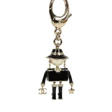 Chanel Chanel Gabrielle Doll Key Ring Black Resin & Faux Pearls Light Gold Tone Hardware | Thumbnail 5 Chanel Chanel Gabrielle Doll Key Ring Black Resin & Faux Pearls Light Gold Tone Hardware | Thumbnail 5