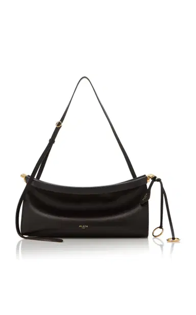 Alaïa Le Click Medium E/W Nubuck Bag | Thumbnail 1 Alaïa Le Click Medium E/W Nubuck Bag | Thumbnail 1