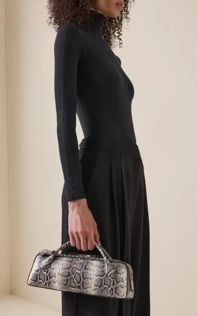 Alaïa Le Teckel Leather Clutch | Thumbnail 3 Alaïa Le Teckel Leather Clutch | Thumbnail 3