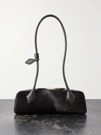 Alaïa Le Teckel Small Leather-trimmed Calf Hair Shoulder Bag | Thumbnail 1 Alaïa Le Teckel Small Leather-trimmed Calf Hair Shoulder Bag | Thumbnail 1
