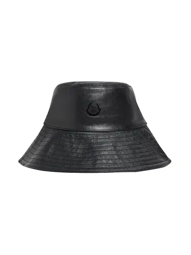 Moncler Genius Women's Moncler x EE72 by Edward Enninful Hat in Leather - Black | Thumbnail 1 Moncler Genius Women's Moncler x EE72 by Edward Enninful Hat in Leather - Black | Thumbnail 1