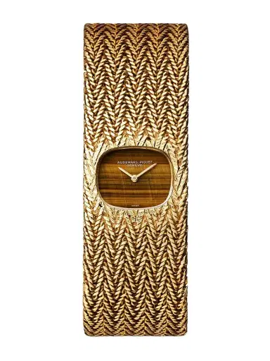Stephanie Windsor + Audemars Piguet Pre-owned 1970s Tiger's Eye Hand-wound 16mm 18-karat Gold Watch, Ref. No. 11825 | Thumbnail 1 Stephanie Windsor + Audemars Piguet Pre-owned 1970s Tiger's Eye Hand-wound 16mm 18-karat Gold Watch, Ref. No. 11825 | Thumbnail 1