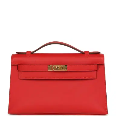 HERMÈS Hermes Kelly Pochette Rouge Radieux Swift Gold Hardware | Thumbnail 1 HERMÈS Hermes Kelly Pochette Rouge Radieux Swift Gold Hardware | Thumbnail 1