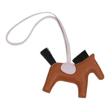 HERMÈS Hermes GriGri Rodeo Bag Charm PM Gold, Black and Mauve Pale Milo Lambskin & Horsehair | Thumbnail 2 HERMÈS Hermes GriGri Rodeo Bag Charm PM Gold, Black and Mauve Pale Milo Lambskin & Horsehair | Thumbnail 2