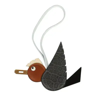 HERMÈS Hermes Birdy Charm Gris Paris, Black, Fauve, Gold, Nata and Bleu Brume Matte Alligator, Box, Barenia, Epsom, Swift Gold Hardware | Thumbnail 1 HERMÈS Hermes Birdy Charm Gris Paris, Black, Fauve, Gold, Nata and Bleu Brume Matte Alligator, Box, Barenia, Epsom, Swift Gold Hardware | Thumbnail 1