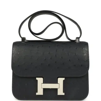 HERMÈS Hermes Constance 1-24 Caban Ostrich Palladium Hardware | Thumbnail 1 HERMÈS Hermes Constance 1-24 Caban Ostrich Palladium Hardware | Thumbnail 1