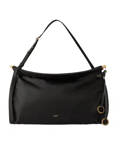 Alaïa Click E/w Large Leather-trimmed Shell Shoulder Bag | Thumbnail 1 Alaïa Click E/w Large Leather-trimmed Shell Shoulder Bag | Thumbnail 1
