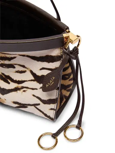 ALAIA Women's Le Clik East West Tiger Calf Hair Shoulder Bag - Naturel | Thumbnail 5 ALAIA Women's Le Clik East West Tiger Calf Hair Shoulder Bag - Naturel | Thumbnail 5