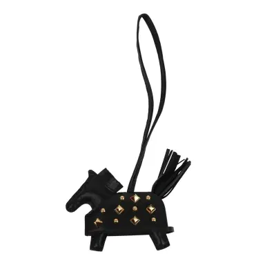 HERMÈS Hermes Rodeo Rock Bag Charm PM Black Milo Lambskin Gold Hardware | Thumbnail 1 HERMÈS Hermes Rodeo Rock Bag Charm PM Black Milo Lambskin Gold Hardware | Thumbnail 1