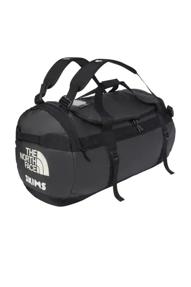 The North Face x SKIMS Large Base Camp Duffel Bag | Thumbnail 1 The North Face x SKIMS Large Base Camp Duffel Bag | Thumbnail 1
