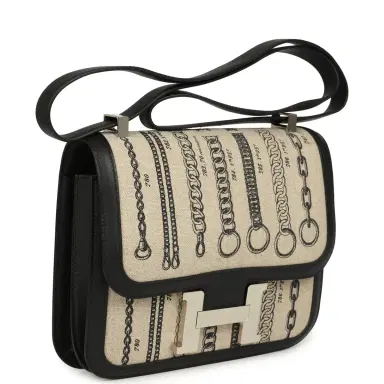 HERMÈS Pre-owned Hermes Constance 24 Toile De Camp Déchaînée and Black Swift Palladium Hardware | Thumbnail 2 HERMÈS Pre-owned Hermes Constance 24 Toile De Camp Déchaînée and Black Swift Palladium Hardware | Thumbnail 2