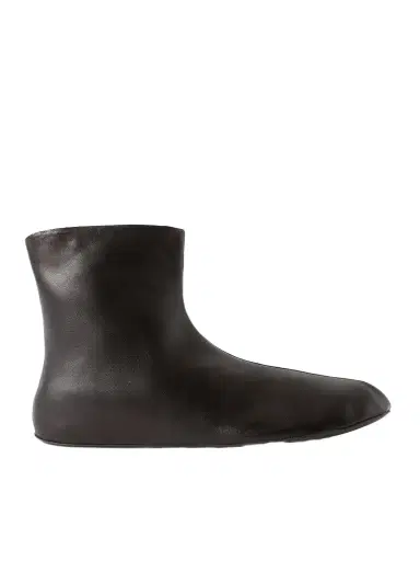 The Row Stella Leather And Shearling Ankle Boots | Thumbnail 1 The Row Stella Leather And Shearling Ankle Boots | Thumbnail 1