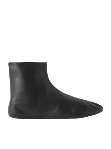 The Row Stella Leather And Shearling Ankle Boots | Thumbnail 1 The Row Stella Leather And Shearling Ankle Boots | Thumbnail 1