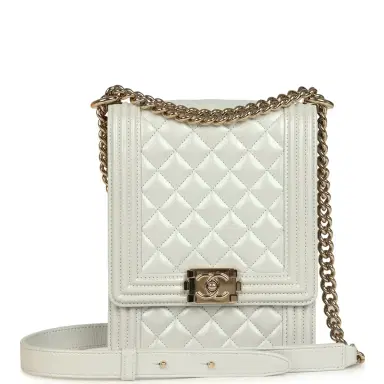 Chanel Pre-owned Chanel North South Boy Bag Light Grey Iridescent Calfskin Light Gold Hardware | Thumbnail 1 Chanel Pre-owned Chanel North South Boy Bag Light Grey Iridescent Calfskin Light Gold Hardware | Thumbnail 1