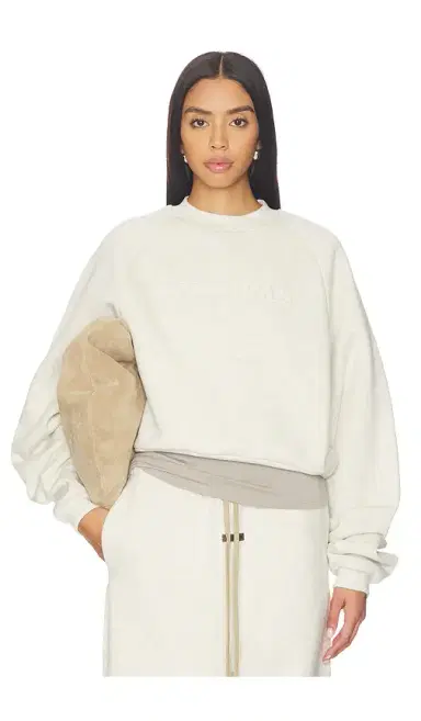 Fear of God Essentials 90's Raglan Sweatshirt | Thumbnail 1 Fear of God Essentials 90's Raglan Sweatshirt | Thumbnail 1