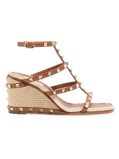 Valentino Garavani Women's Rockstud 80MM Wedge Sandals in Calfskin Leather - Saddle Brown - Size 12 | Thumbnail 1 Valentino Garavani Women's Rockstud 80MM Wedge Sandals in Calfskin Leather - Saddle Brown - Size 12 | Thumbnail 1