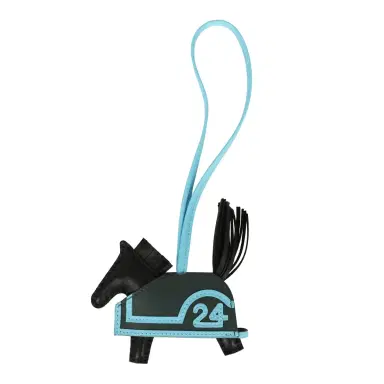 HERMÈS Hermes Rodeo Robeo 24 Charm PM Black, Vert Mangrove and Celeste Milo Lambskin | Thumbnail 1 HERMÈS Hermes Rodeo Robeo 24 Charm PM Black, Vert Mangrove and Celeste Milo Lambskin | Thumbnail 1