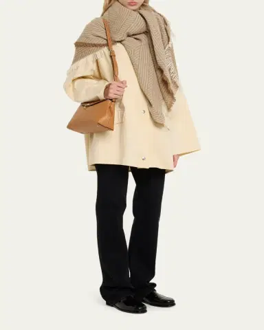 Toteme T-Lock Clutch Bag in Pebble Grain Leather | Thumbnail 9 Toteme T-Lock Clutch Bag in Pebble Grain Leather | Thumbnail 9