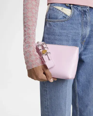 Givenchy Voyou Small Pouch Bag in Leather with Buckle and Heart Lock Wristlet | Thumbnail 1 Givenchy Voyou Small Pouch Bag in Leather with Buckle and Heart Lock Wristlet | Thumbnail 1