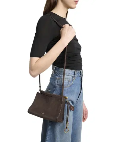 Alaïa Le Click Small Shoulder Bag in Nubuck Leather | Thumbnail 1 Alaïa Le Click Small Shoulder Bag in Nubuck Leather | Thumbnail 1