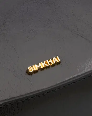 Simkhai Logan Metal-Trim Shiny Leather Crossbody Bag | Thumbnail 10 Simkhai Logan Metal-Trim Shiny Leather Crossbody Bag | Thumbnail 10