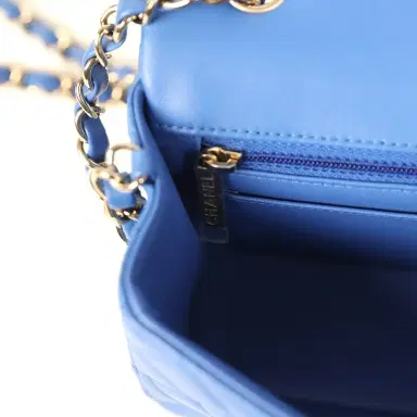 Chanel Preowned Chanel Mini Rectangular Hollywood Charms Flap Bag Blue Lambskin Light Gold Hardware | Thumbnail 9 Chanel Preowned Chanel Mini Rectangular Hollywood Charms Flap Bag Blue Lambskin Light Gold Hardware | Thumbnail 9