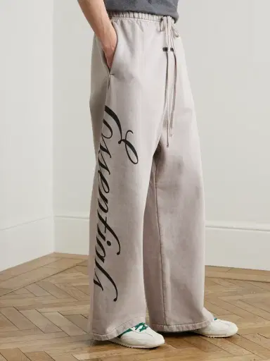 Fear of God Essentials Logo-Print Cotton-Jersey Sweatpants - Men | Thumbnail 3 Fear of God Essentials Logo-Print Cotton-Jersey Sweatpants - Men | Thumbnail 3