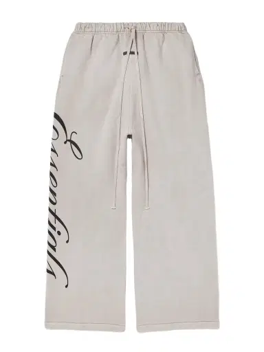 Fear of God Essentials Logo-Print Cotton-Jersey Sweatpants - Men | Thumbnail 1 Fear of God Essentials Logo-Print Cotton-Jersey Sweatpants - Men | Thumbnail 1