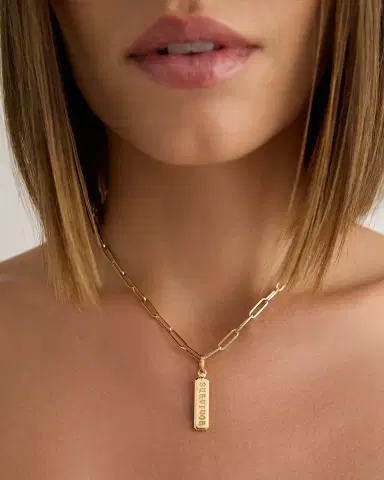 Jennifer Fisher Survivor Dog Tag in 18k Yellow Gold | Thumbnail 1 Jennifer Fisher Survivor Dog Tag in 18k Yellow Gold | Thumbnail 1