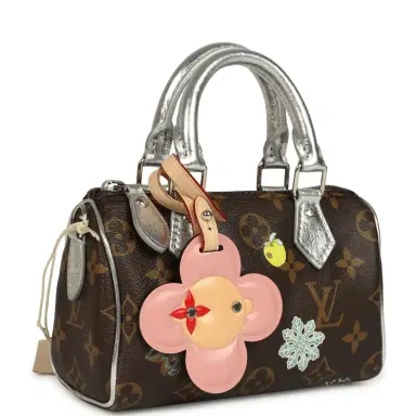 Louis Vuitton Louis Vuitton "57th Street NYC" Vivienne Nano Speedy Bag Brown Monogram Snowy Pearl Gold Hardware | Thumbnail 2 Louis Vuitton Louis Vuitton "57th Street NYC" Vivienne Nano Speedy Bag Brown Monogram Snowy Pearl Gold Hardware | Thumbnail 2