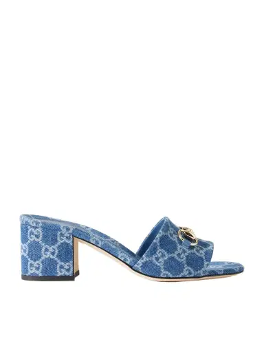 Gucci Horsebit-embellished Logo-print Denim Mules | Thumbnail 1 Gucci Horsebit-embellished Logo-print Denim Mules | Thumbnail 1